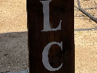 Double sided welcome/beware sign